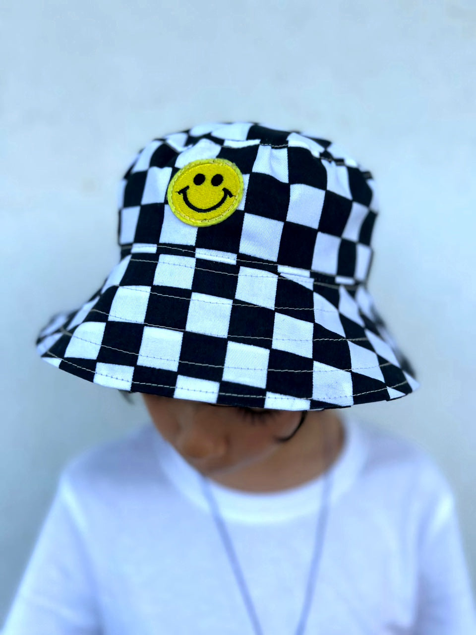 Smile check bucket hat