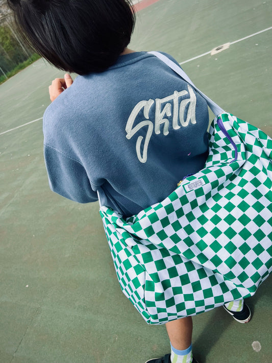 Checked duffle bag